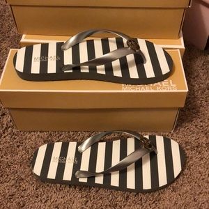 NIB stripped Michael Kors flip flops size 9M